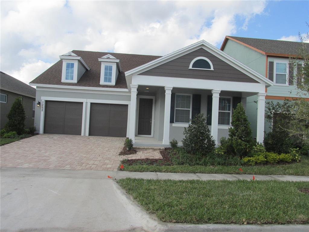 front view of a house with a yard