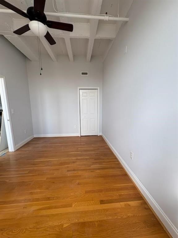 32 Peachtree Street Northwest, Unit 1506 Atlanta, GA 30303 - Photo 15 of 41 a view of empty room with wooden floor