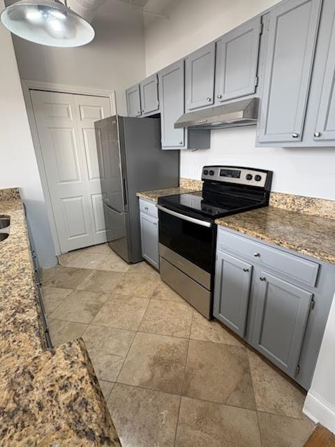 32 Peachtree Street Northwest, Unit 1506 Atlanta, GA 30303 - Photo 2 of 41 a kitchen with stainless steel appliances granite countertop a refrigerator sink and cabinets