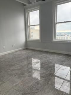 32 Peachtree Street Northwest, Unit 1506 Atlanta, GA 30303 - Photo 25 of 41 an empty room with windows