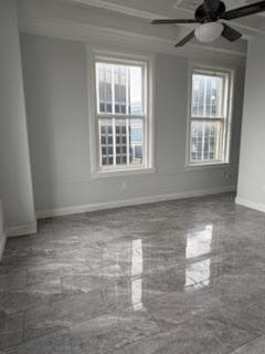 32 Peachtree Street Northwest, Unit 1506 Atlanta, GA 30303 - Photo 28 of 41 a view of empty room with wooden floor and fan