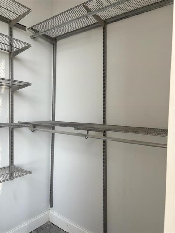 32 Peachtree Street Northwest, Unit 1506 Atlanta, GA 30303 - Photo 35 of 41 a view of a room with racks on the wall