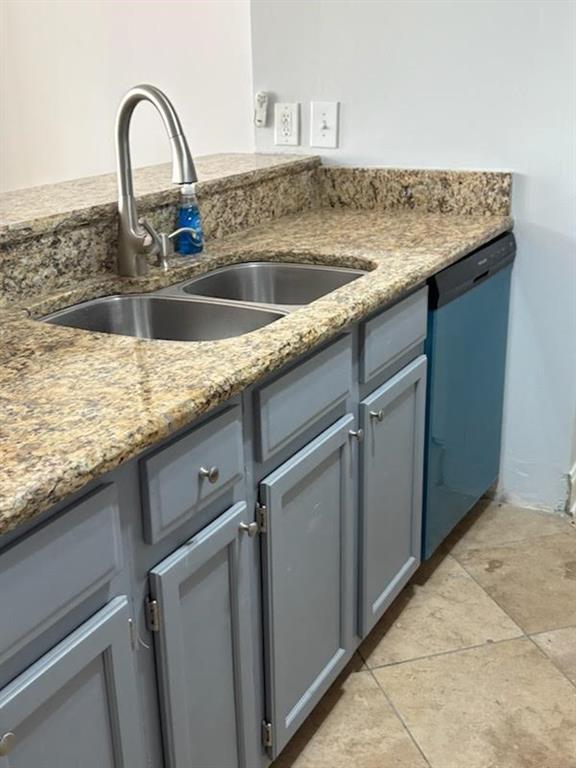 32 Peachtree Street Northwest, Unit 1506 Atlanta, GA 30303 - Photo 8 of 41 a view of a kitchen counter top a sink and dishwasher with wooden floor