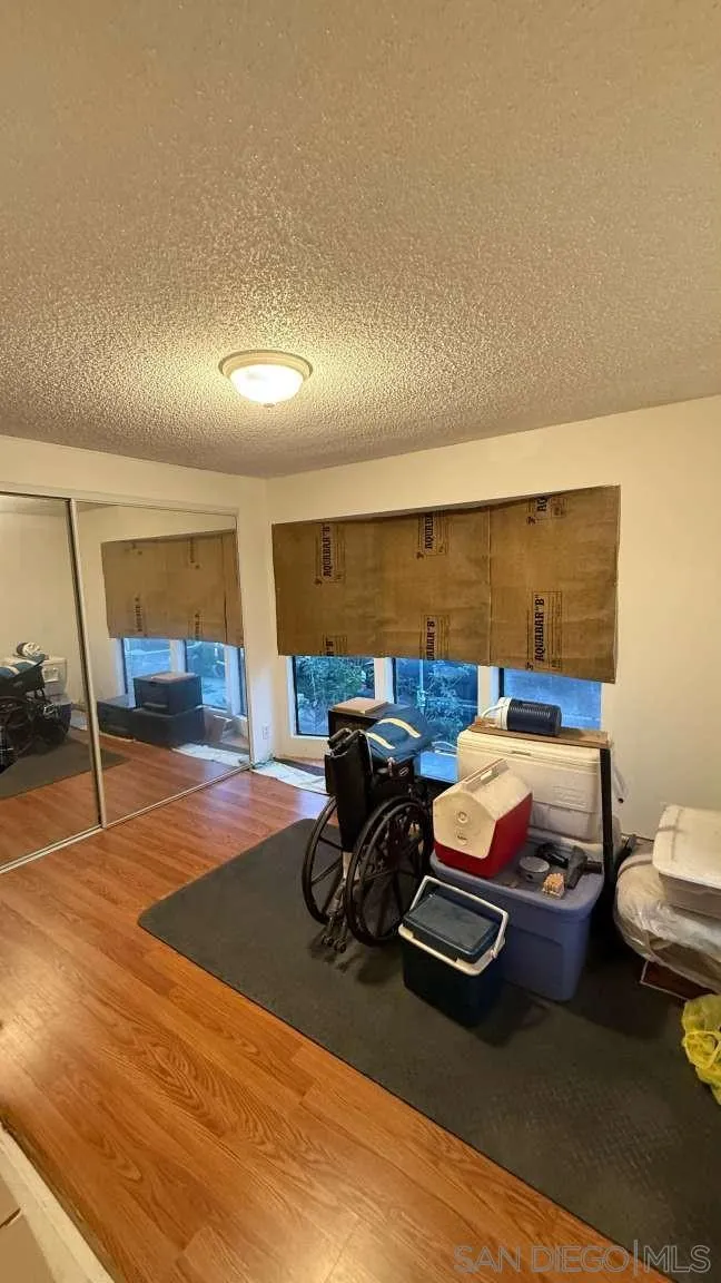 16134 Road 28 Madera, CA 93638 - Photo 5 of 6 a bedroom with furniture and window