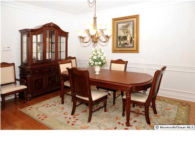 94 Brookfield Drive Jackson, NJ 08527 - Photo 3 of 3 a view of a dining room with furniture and wooden floor