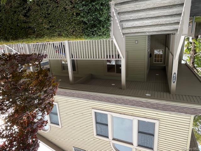 a view of a house with a deck