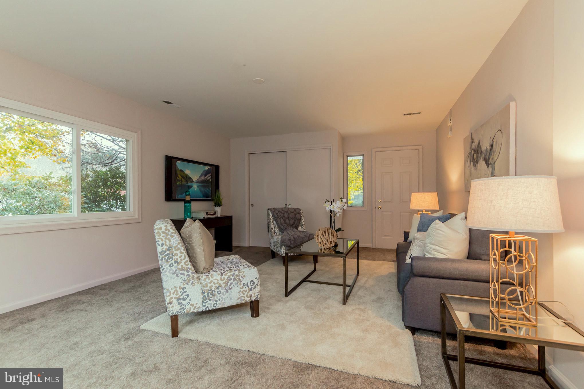 2809 Homecrest Circle Silver Spring, MD 20906 - Photo 16 of 31 Family room showing closet and exit to patio