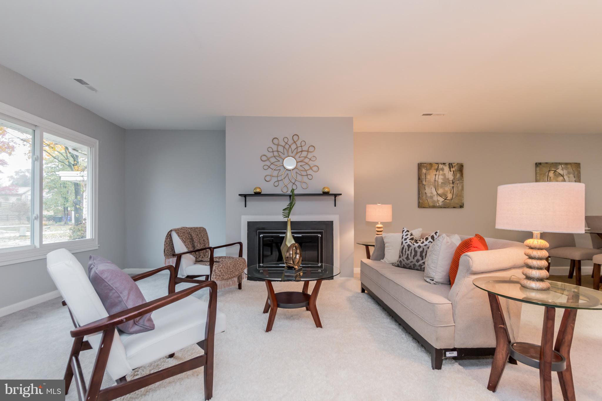 2809 Homecrest Circle Silver Spring, MD 20906 - Photo 4 of 31 Living room with cozy fireplace