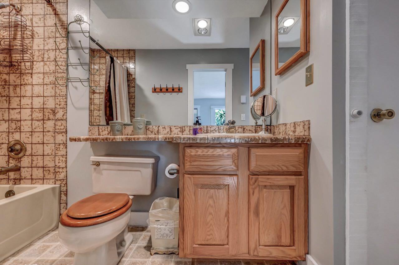 116 Snow Ridge Cir Lake Lake Harmony, PA 18624 - Photo 36 of 66 a bathroom with a granite countertop toilet sink and mirror