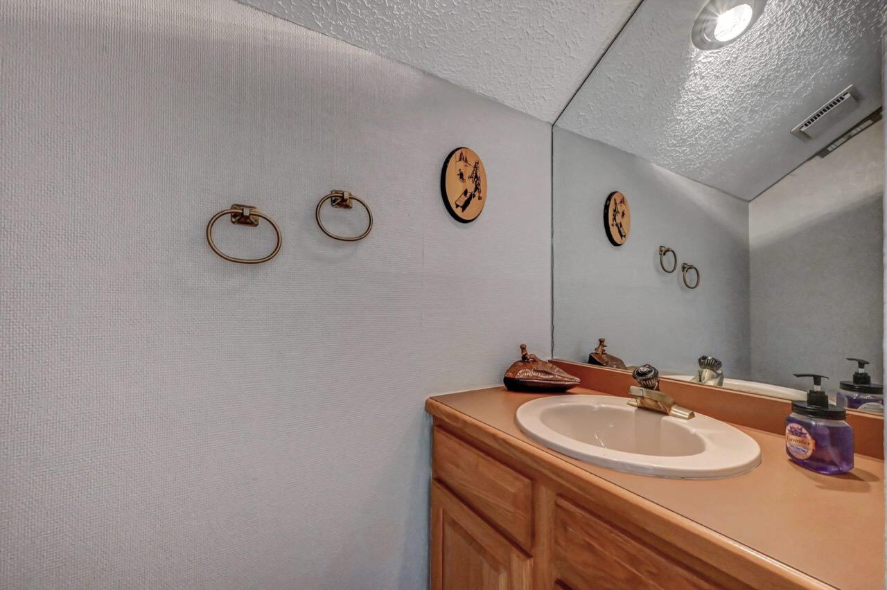 116 Snow Ridge Cir Lake Lake Harmony, PA 18624 - Photo 48 of 66 a bathroom with a sink and a mirror