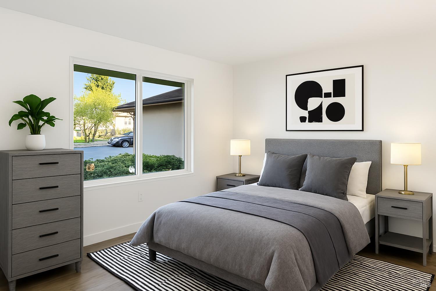 6041 Evelyn Avenue Rohnert Park, CA 94928 - Photo 23 of 37 a bedroom with a bed and a window