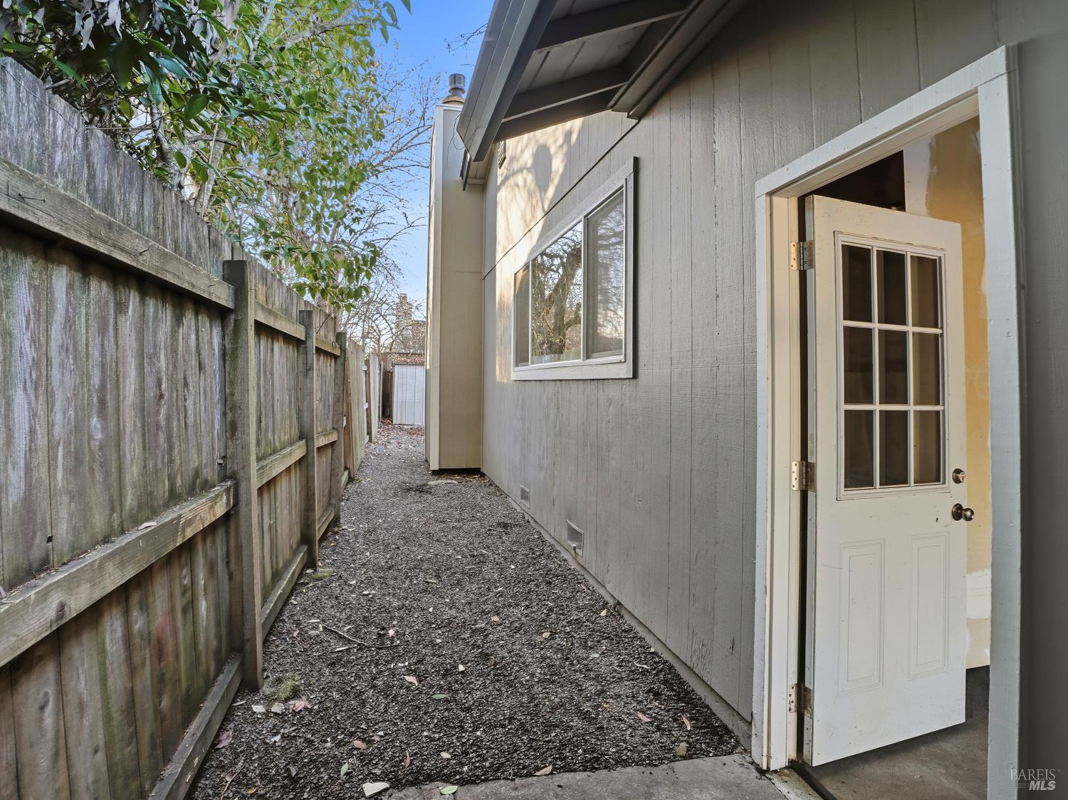 6041 Evelyn Avenue Rohnert Park, CA 94928 - Photo 36 of 37 a view of a pathway of a house with wooden fence