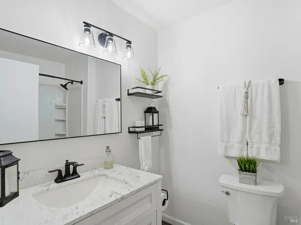a bathroom with a sink and a toilet