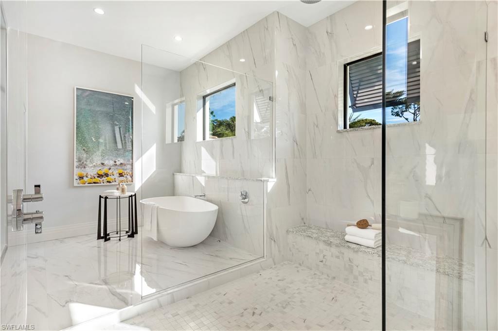 437 West Street Naples, FL 34108 - Photo 16 of 35 a living room with furniture and a table