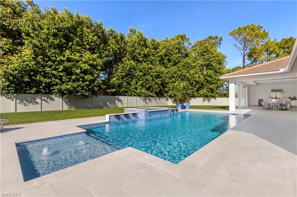 437 West Street Naples, FL 34108 - Photo 2 of 35 a view of a house with a yard
