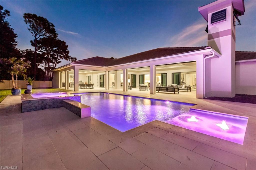 437 West Street Naples, FL 34108 - Photo 35 of 35 a swimming pool with outdoor seating yard and barbeque oven