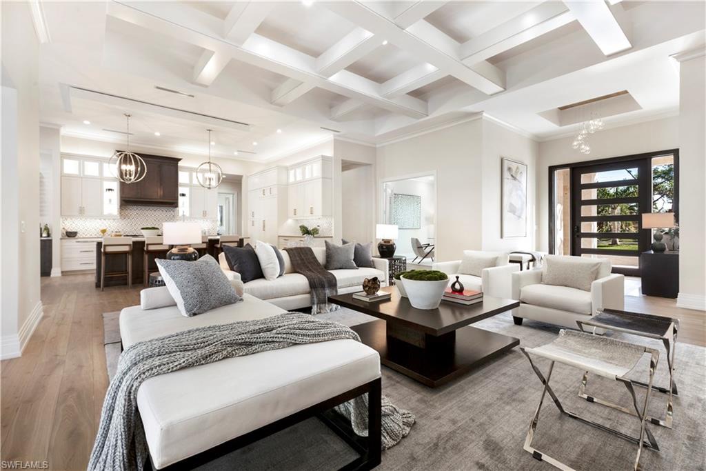 437 West Street Naples, FL 34108 - Photo 4 of 35 a living room with furniture and a large window