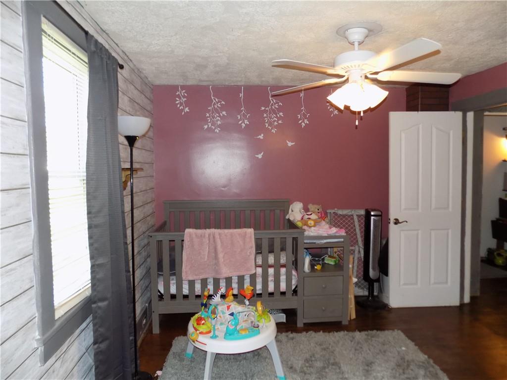 1067 Silver Lane McKees Rocks, PA 15136 - Photo 16 of 25 a dining room with furniture and wooden floor