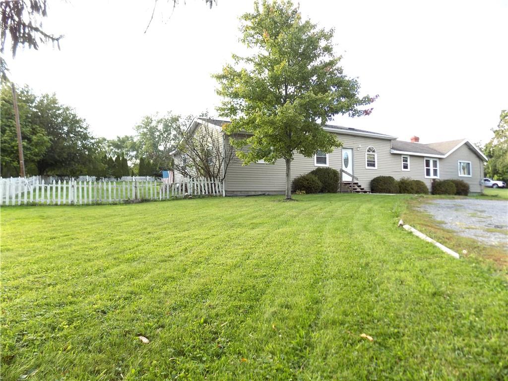 1067 Silver Lane McKees Rocks, PA 15136 - Photo 2 of 25 a view of a house with a big yard and large trees