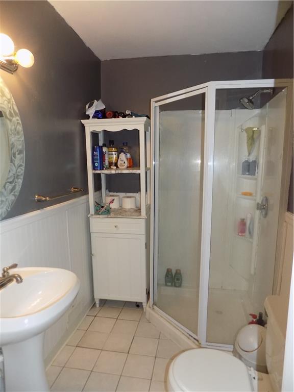 1067 Silver Lane McKees Rocks, PA 15136 - Photo 25 of 25 a bathroom with a sink toilet and shower