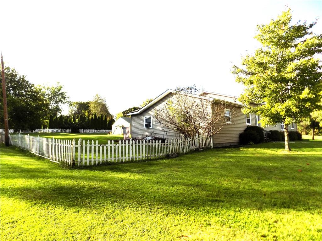 1067 Silver Lane McKees Rocks, PA 15136 - Photo 3 of 25 a view of a house with a yard and a garden