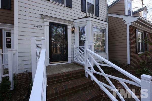 4602 Hamptonshire Drive Raleigh, NC 27613 - Photo 2 of 16 a front view of a house with stairs