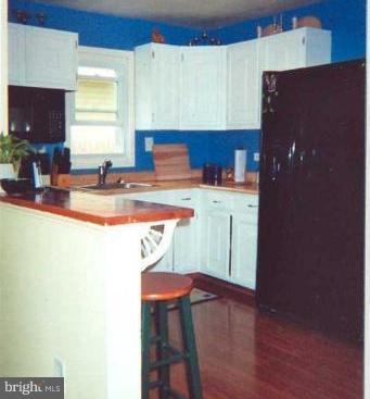 7830 East Shore Road Pasadena, MD 21122 - Photo 8 of 11 KITCHEN