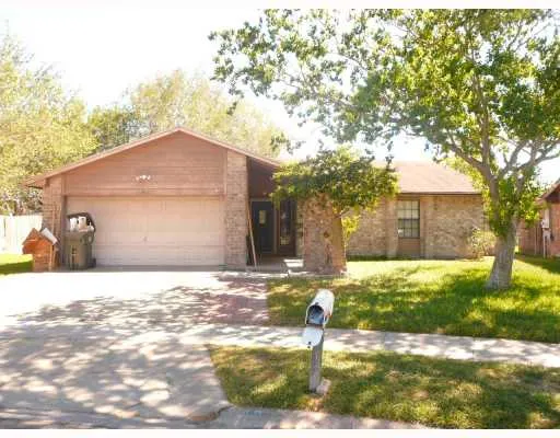 a house view with a outdoor space