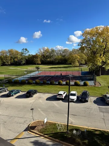 a view of a building with porch and couches