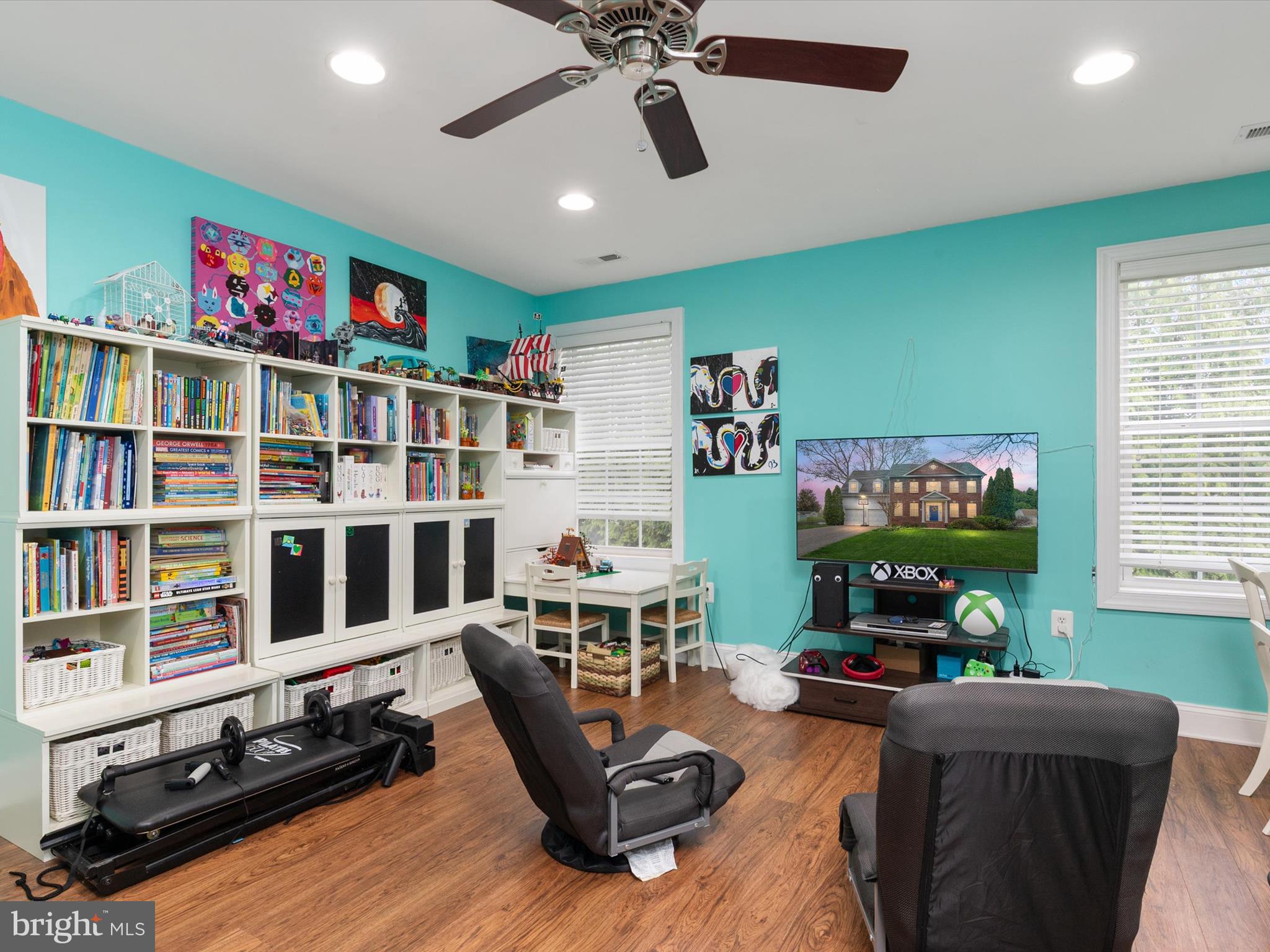 688 Red Cedar Road Annapolis, MD 21409 - Photo 28 of 54 a living room with furniture gym equipment and a window