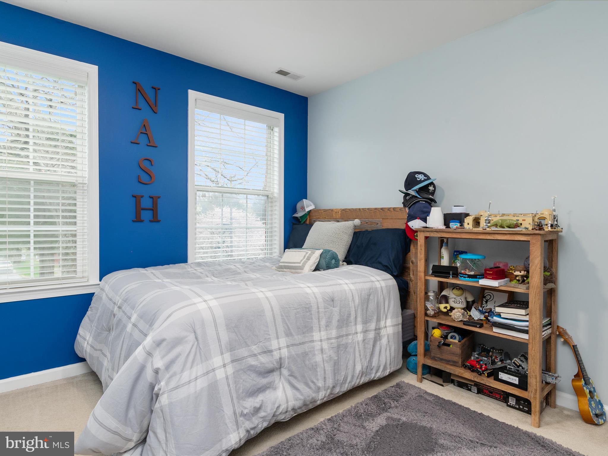 688 Red Cedar Road Annapolis, MD 21409 - Photo 36 of 54 a bedroom with a bed and a window