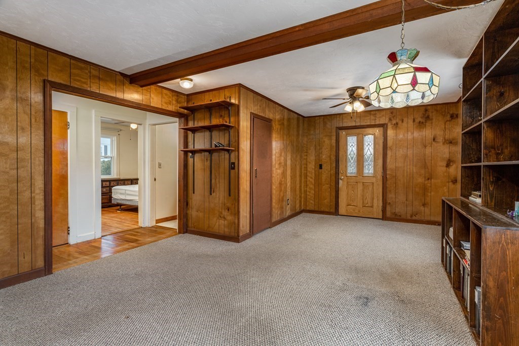 18 Page Street Shirley, MA 01464 - Photo 15 of 41 an empty room with wooden floor and windows