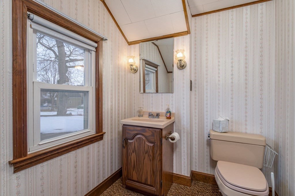 18 Page Street Shirley, MA 01464 - Photo 24 of 41 a bathroom with a toilet a sink and a mirror