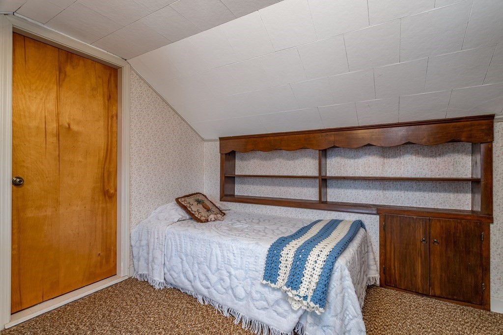 18 Page Street Shirley, MA 01464 - Photo 27 of 41 a bedroom with a bed and a window