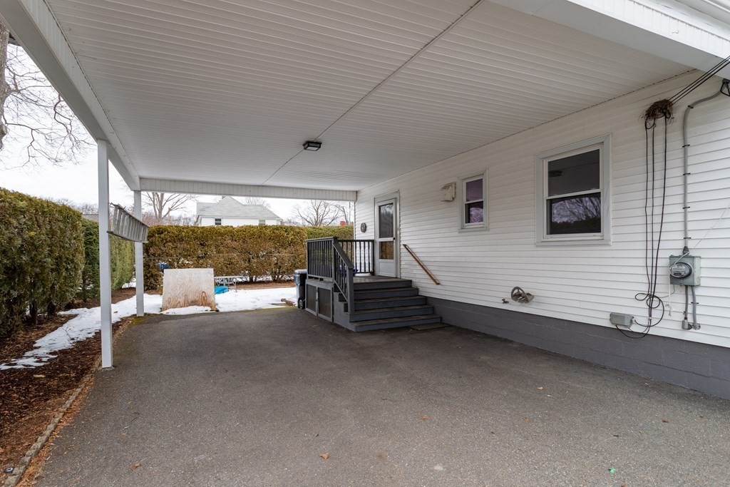18 Page Street Shirley, MA 01464 - Photo 31 of 41 a bedroom with furniture and large windows