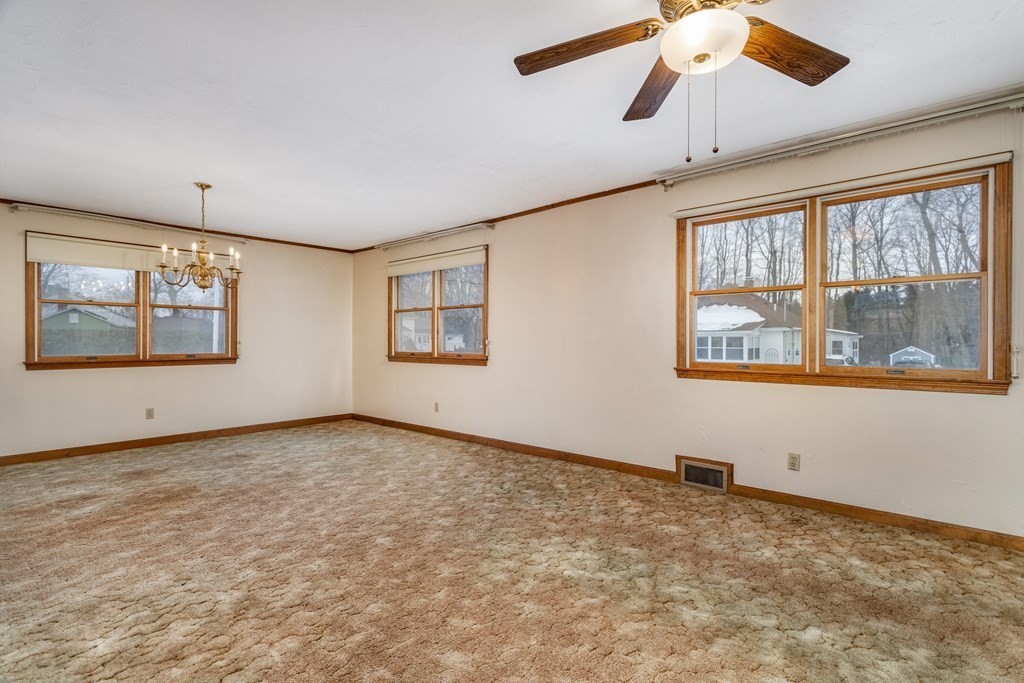 18 Page Street Shirley, MA 01464 - Photo 5 of 41 a view of an empty room with a window