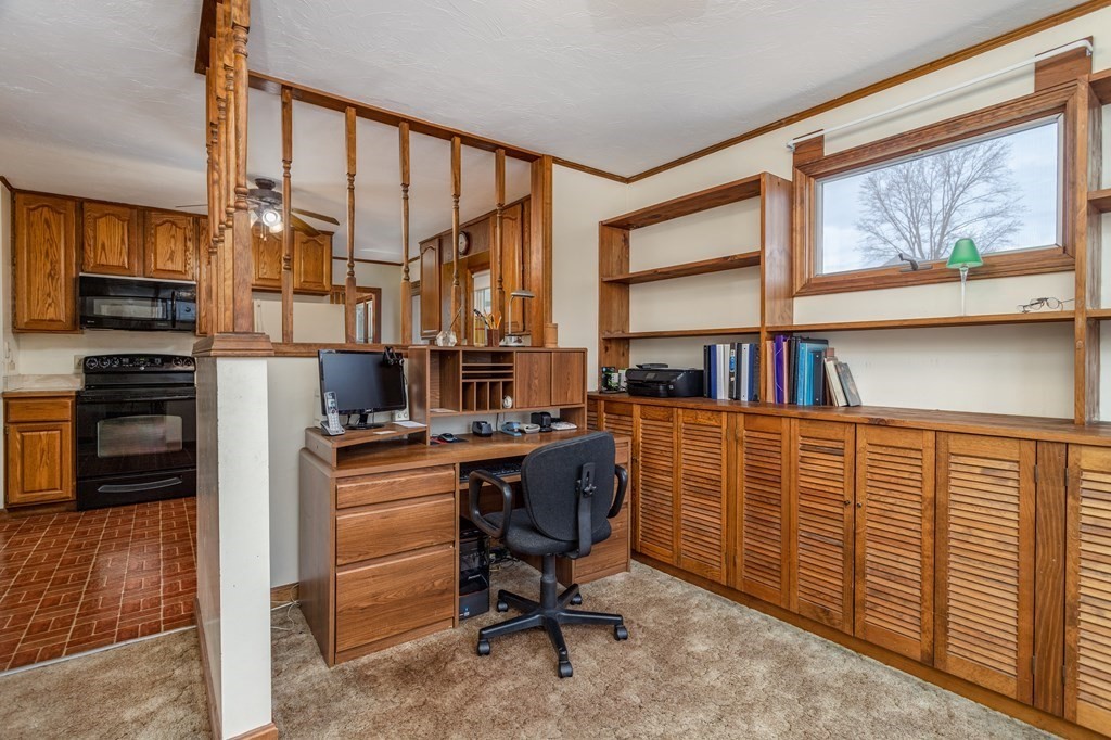 18 Page Street Shirley, MA 01464 - Photo 9 of 41 a view of a workspace with furniture
