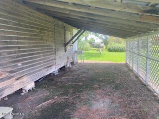 294 Pasture Branch Road Rose Hill, NC 28458 - Photo 22 of 23 leanto on barn