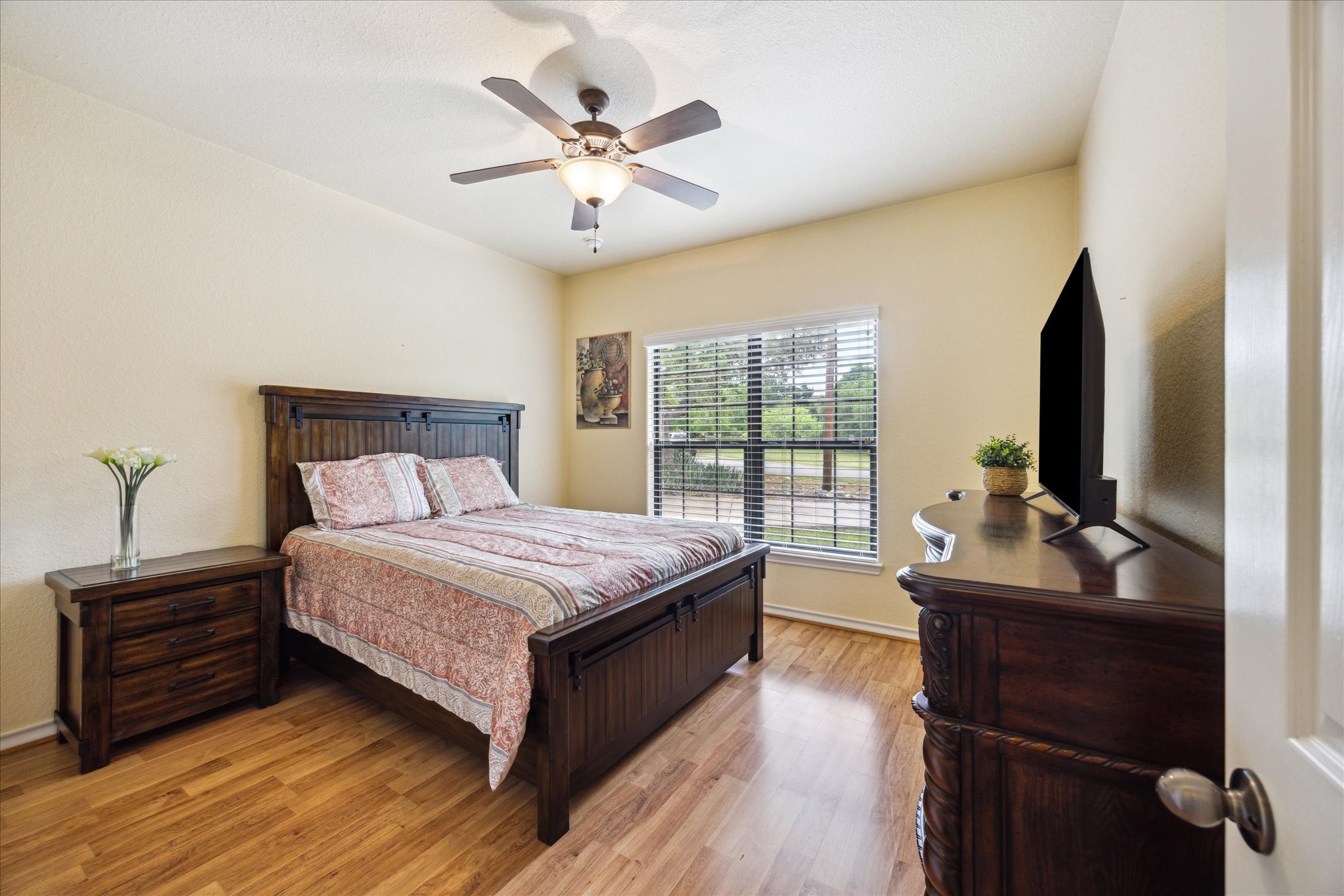 101 High Ridge Circle San Marcos, TX 78666 - Photo 24 of 31 The third bedroom even has plenty of room for another queen bed, dresser and two bedside tables.
