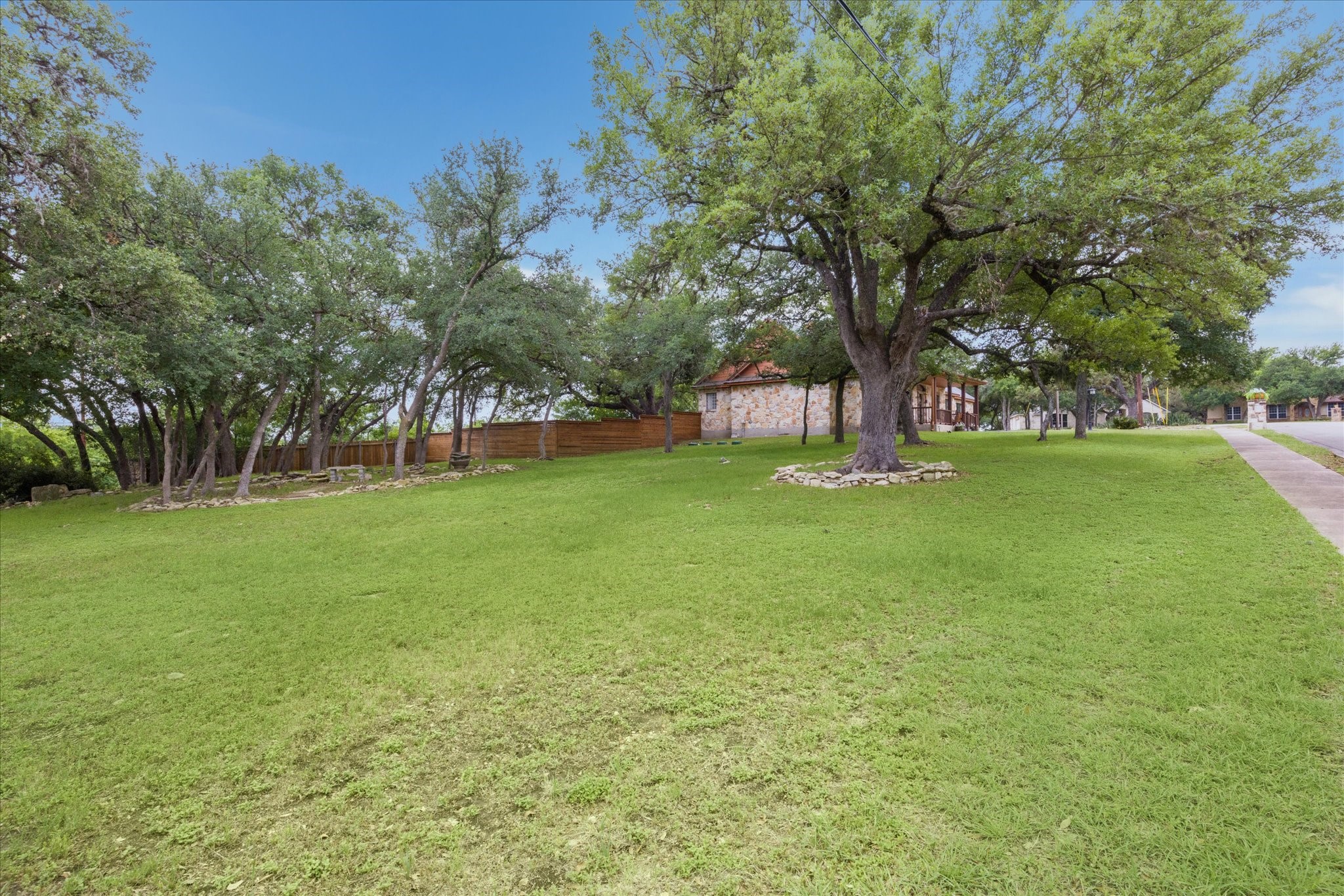101 High Ridge Circle San Marcos, TX 78666 - Photo 7 of 31 Left, corner of the yard.