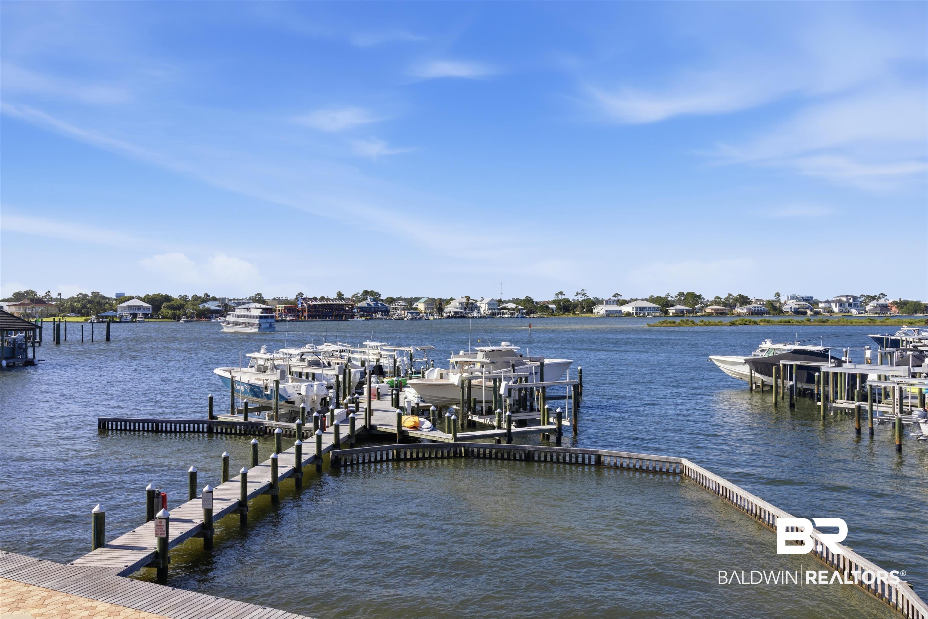 3564 Bayou Road, Unit 203 Orange Beach, AL 36561 - Photo 15 of 53 Waterfront property featuring a private dock and boat slips