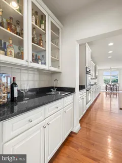 a room with a table and a potted plant