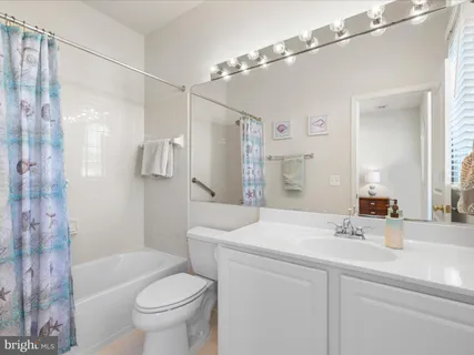 a view of a golf course with a lake view