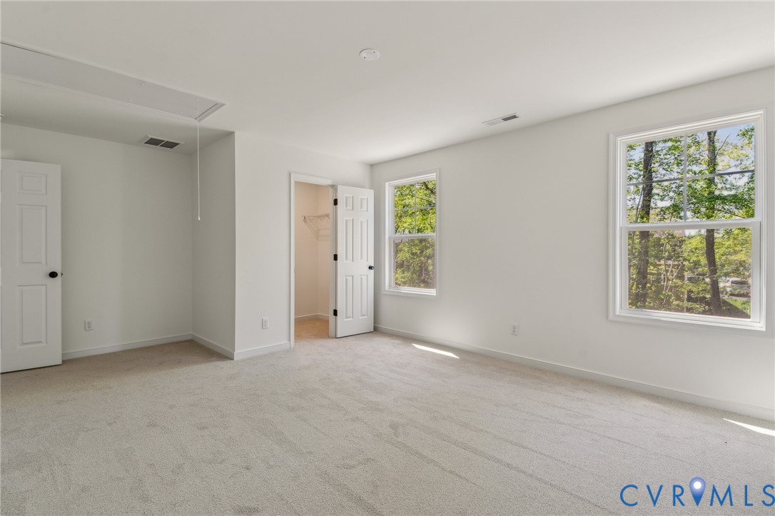 3953 Robins Ridge Drive Moseley, VA 23120 - Photo 15 of 25 a view of an empty room with a window