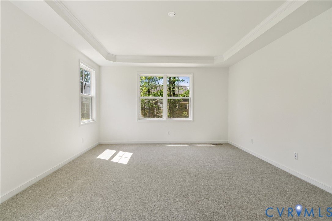 3953 Robins Ridge Drive Moseley, VA 23120 - Photo 10 of 25 an empty room with windows