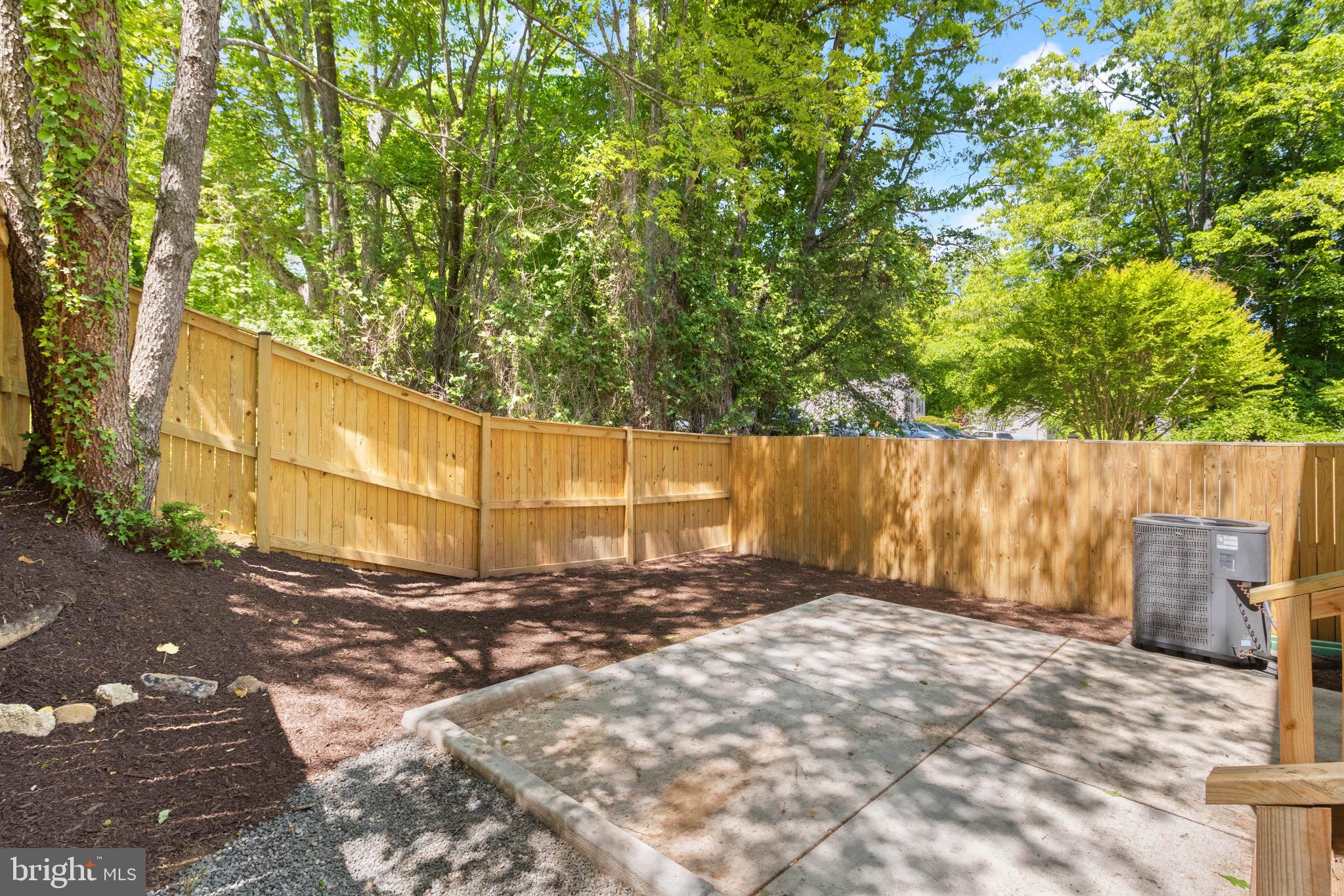 8581 Chester Grove Court Springfield, VA 22153 - Photo 17 of 38 a view of a backyard of the house