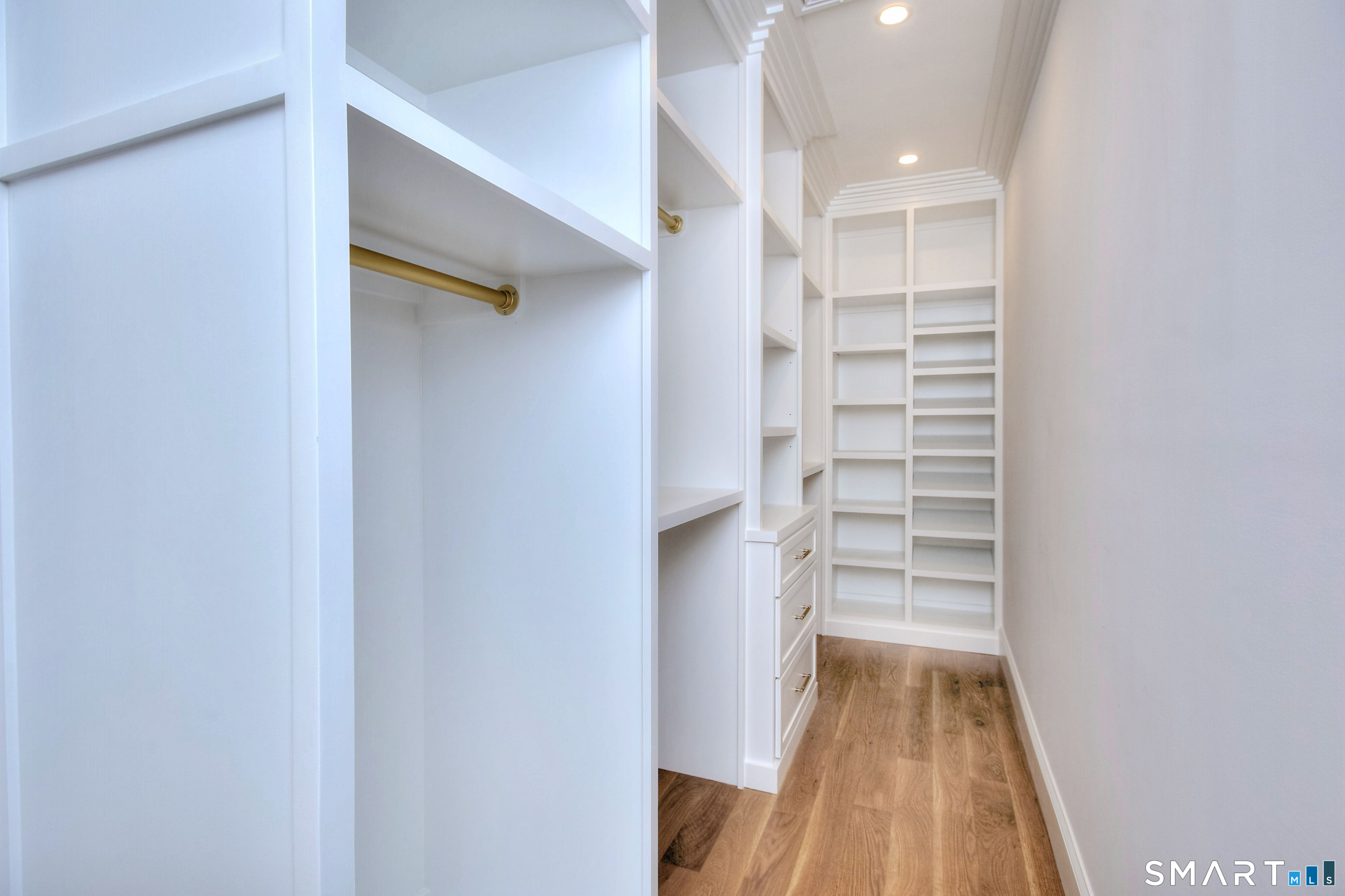 48 Kettle Creek Road Weston, CT 06883 - Photo 28 of 40 a view of walk in closet with empty racks