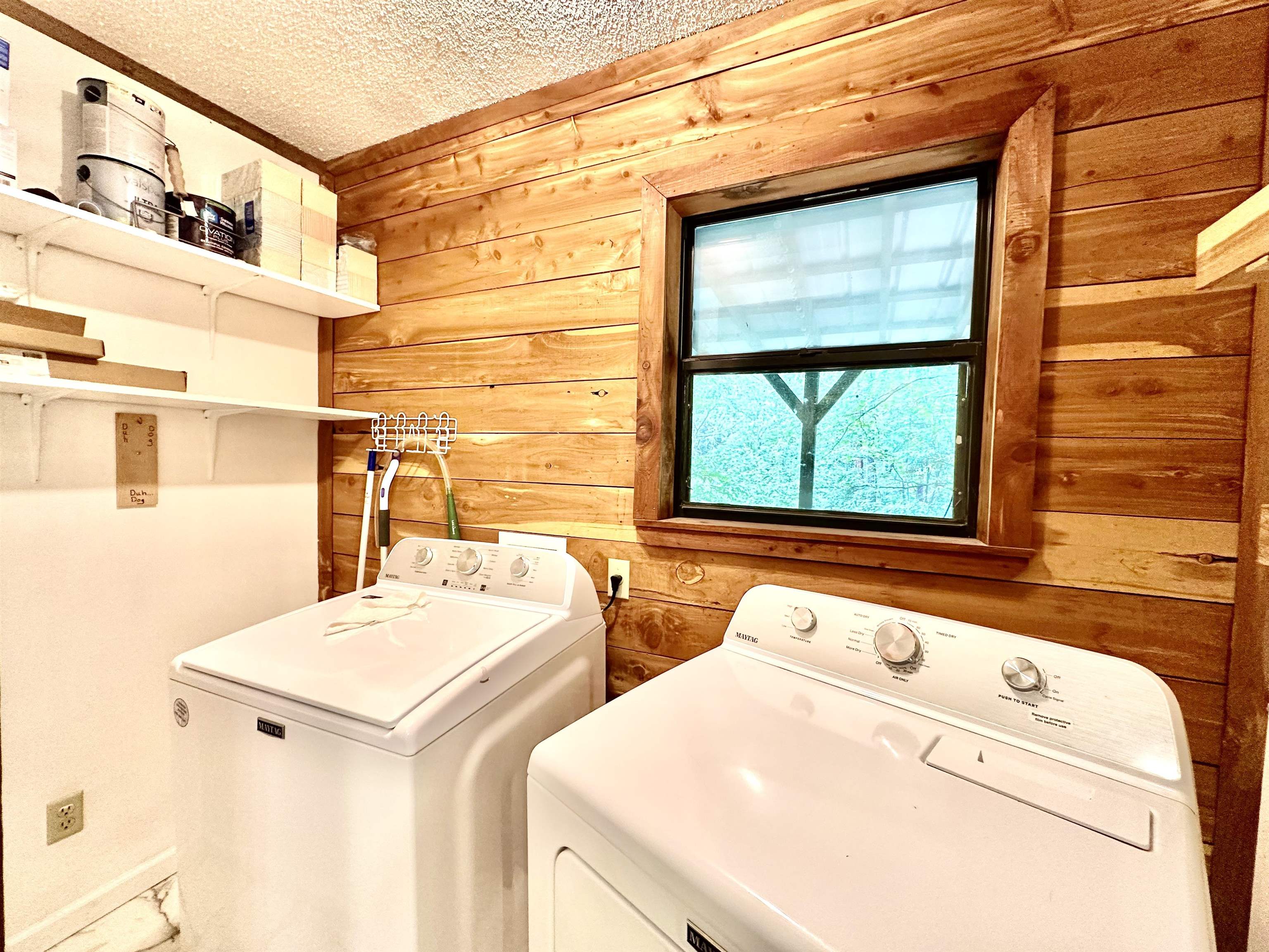 25 Kerr Lane Savannah, TN 38372 - Photo 25 of 36 Laundry area featuring wood-paneled walls and a window