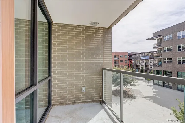 a view of a backyard with sitting area