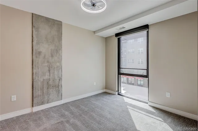 a bathroom with double sink and a mirror